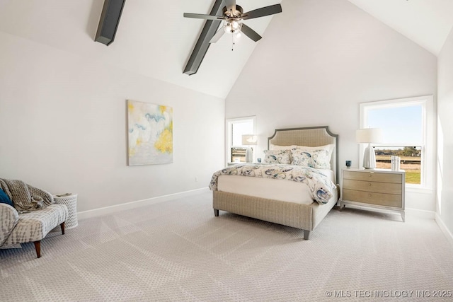 carpeted bedroom with beam ceiling, ceiling fan, and high vaulted ceiling