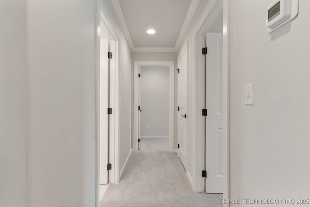 corridor featuring crown molding