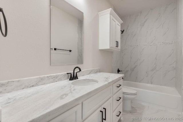 full bathroom featuring vanity, toilet, and tiled shower / bath