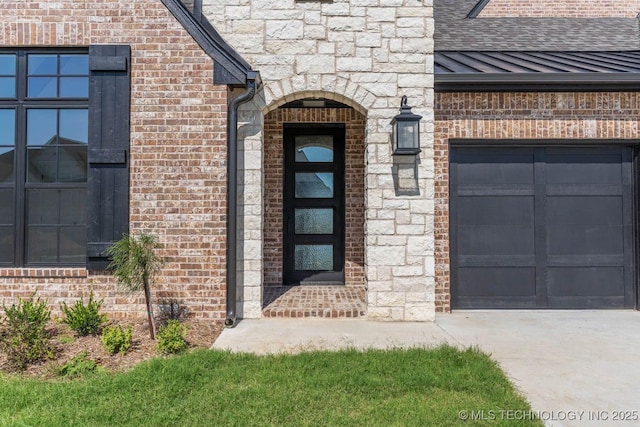 entrance to property featuring a garage