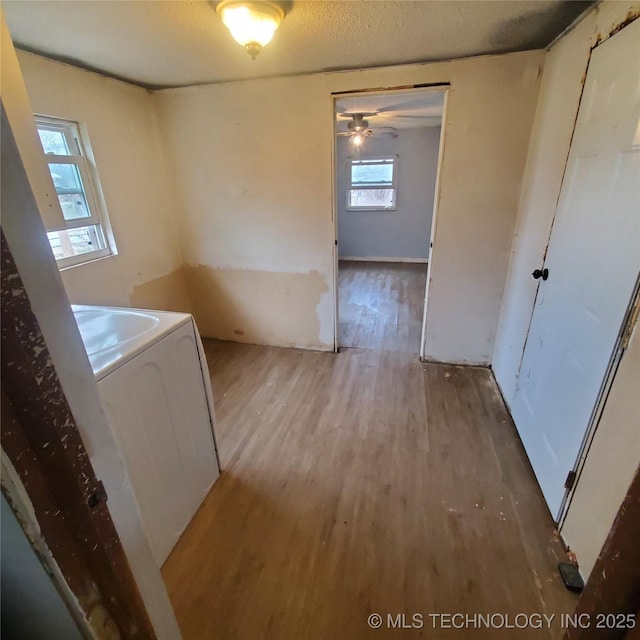 laundry room featuring washer / clothes dryer, hardwood / wood-style floors, and ceiling fan