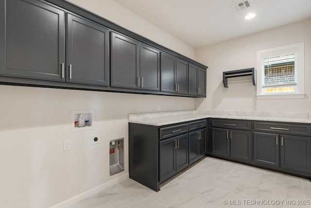 washroom with washer hookup, electric dryer hookup, visible vents, cabinet space, and marble finish floor