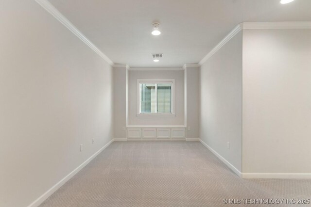 empty room with visible vents, crown molding, light carpet, baseboards, and recessed lighting