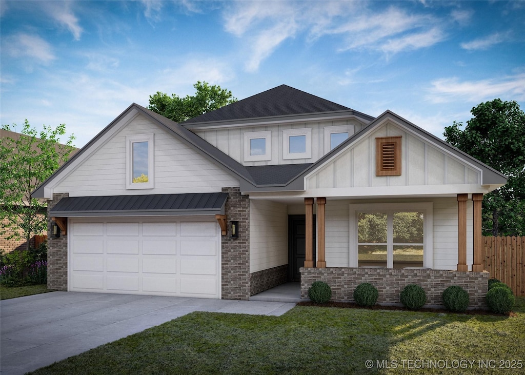 view of front of home featuring a garage and a front yard