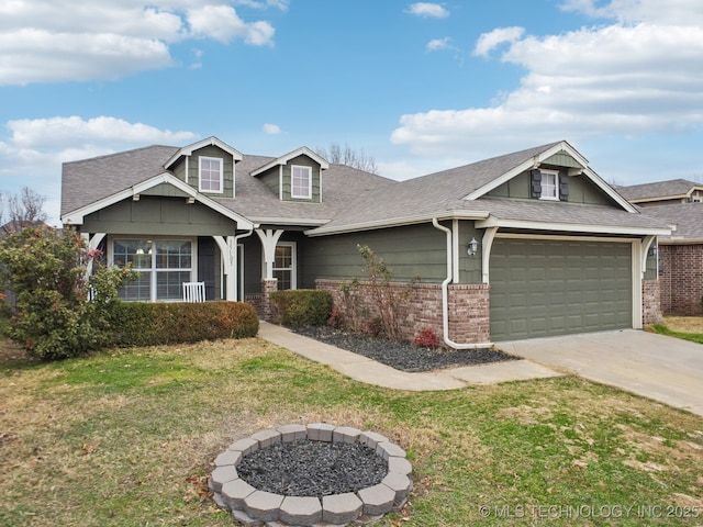 craftsman inspired home with a garage and a front lawn