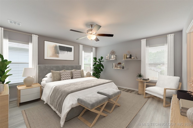 bedroom featuring ceiling fan and light hardwood / wood-style flooring