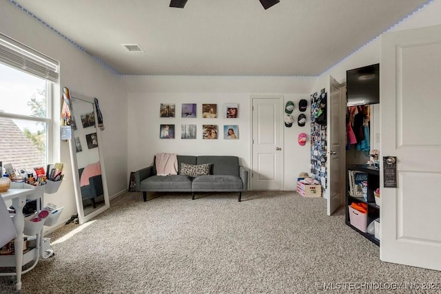 living area with carpet flooring