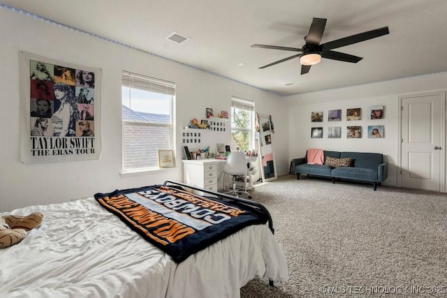 bedroom featuring ceiling fan and carpet floors