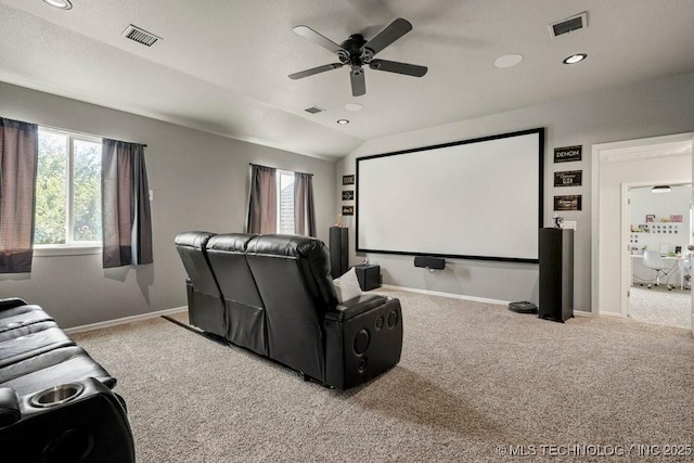 carpeted cinema with a textured ceiling, ceiling fan, and lofted ceiling