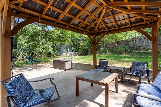 view of patio with a gazebo and a trampoline