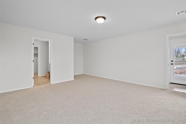 view of carpeted spare room