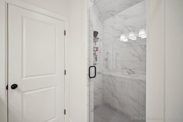 bathroom featuring an enclosed shower