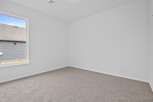 view of carpeted spare room