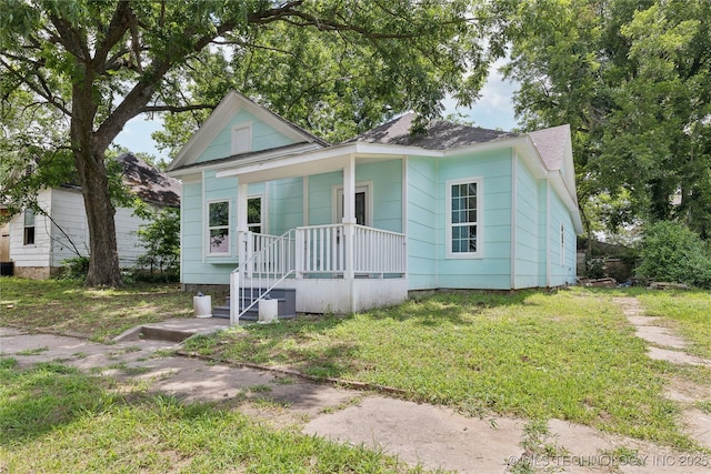 bungalow with a front lawn