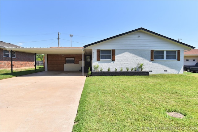 ranch-style home with a front yard and a carport