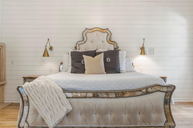 bedroom with light wood-type flooring