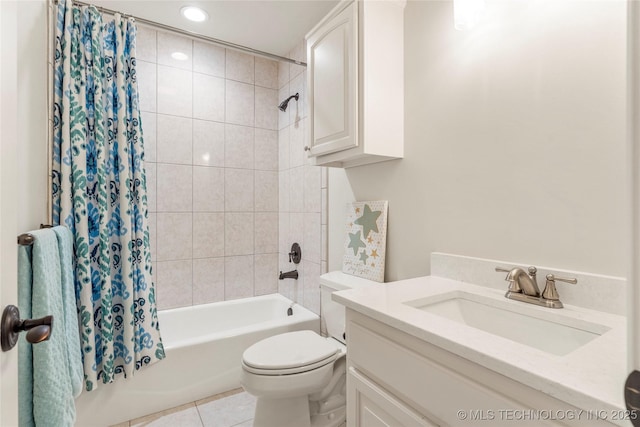 full bathroom featuring tile patterned flooring, shower / bath combination with curtain, toilet, and vanity