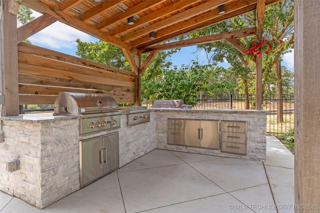 view of patio / terrace with grilling area and exterior kitchen