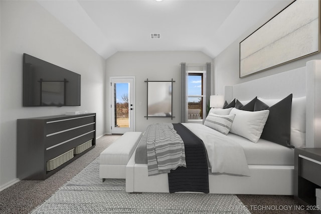 carpeted bedroom featuring lofted ceiling