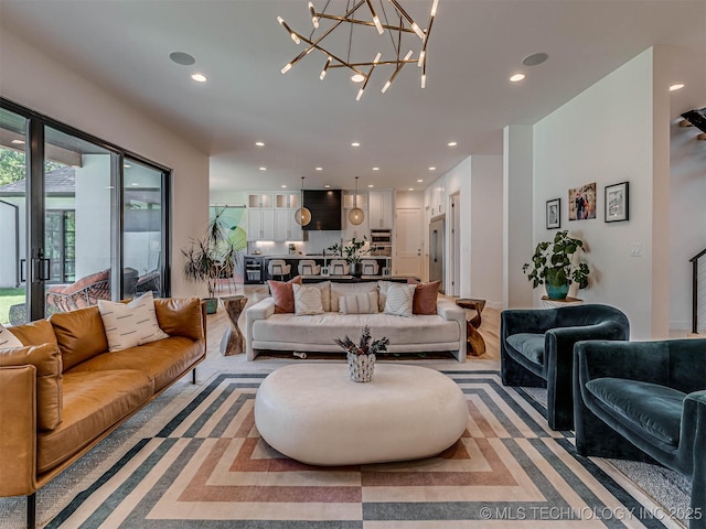 living room with a notable chandelier