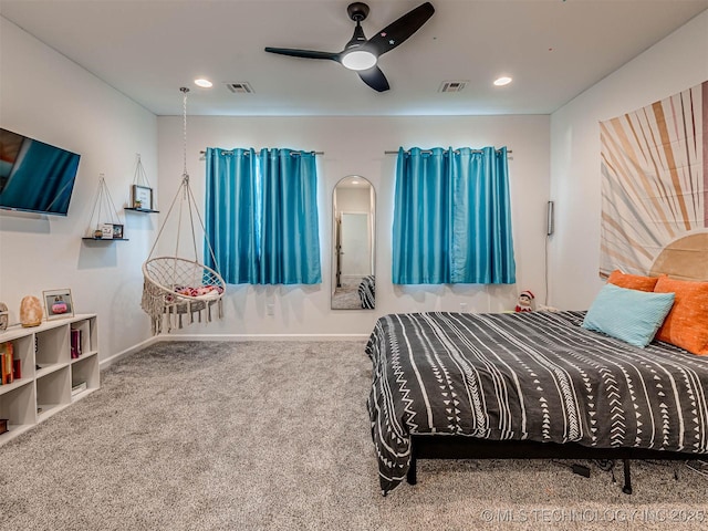 carpeted bedroom featuring ceiling fan