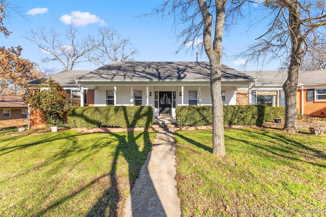 single story home featuring a front yard