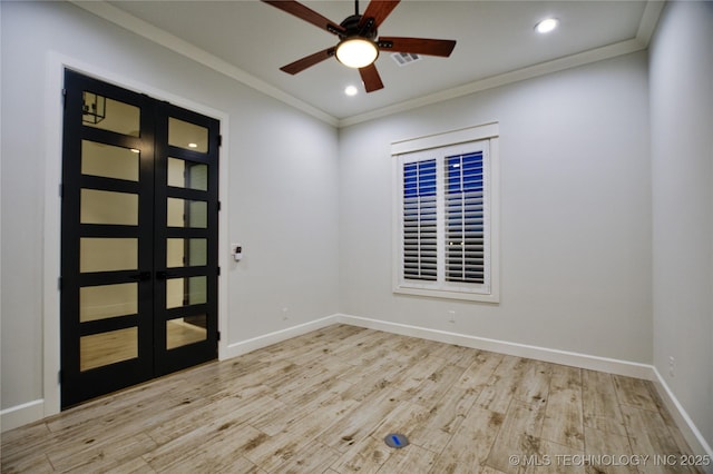 unfurnished room featuring ceiling fan, light hardwood / wood-style floors, ornamental molding, and french doors