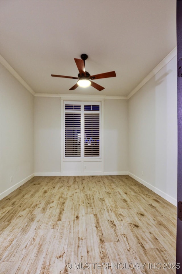 unfurnished room with crown molding, ceiling fan, and light hardwood / wood-style floors