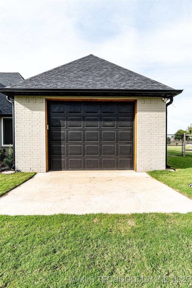 garage with a yard