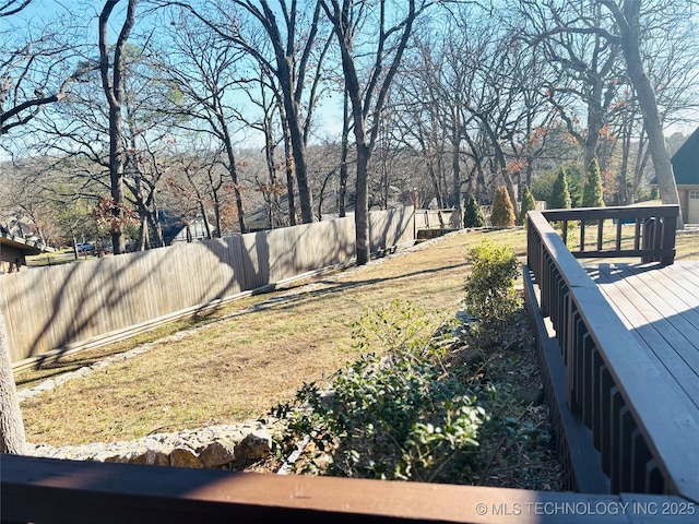 view of yard featuring a wooden deck