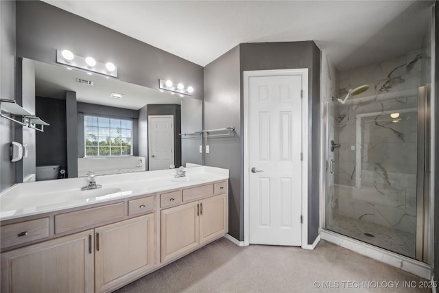 bathroom featuring vanity and walk in shower