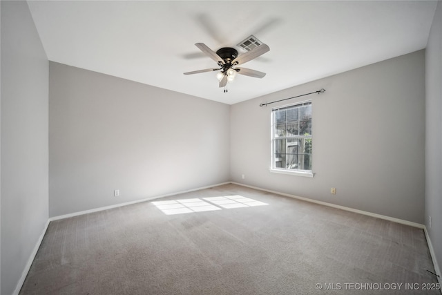 unfurnished room with carpet and ceiling fan