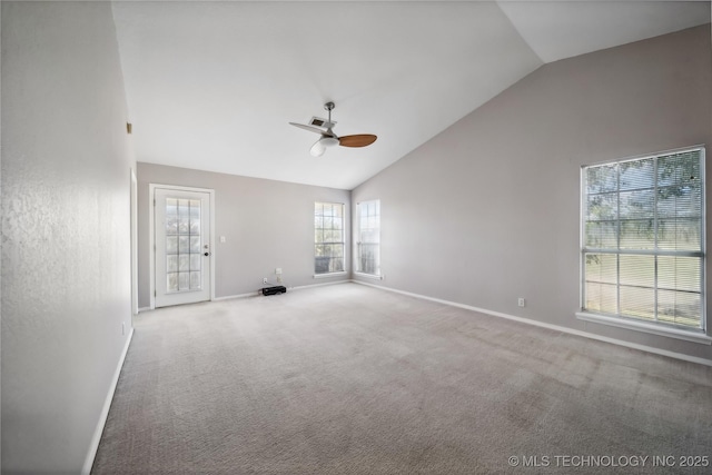 unfurnished living room with light colored carpet, high vaulted ceiling, and ceiling fan