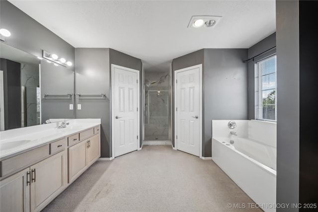 bathroom featuring vanity and separate shower and tub