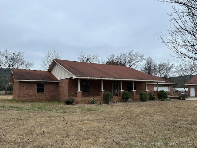 view of property exterior featuring a lawn, a porch, and a garage