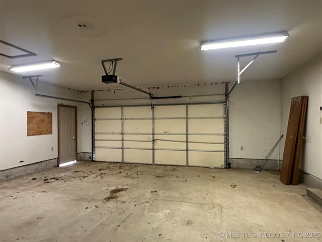 garage featuring a garage door opener