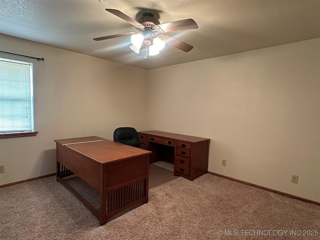 office area with light carpet and ceiling fan