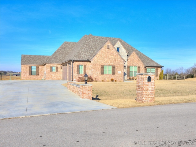 view of front of home with a front yard