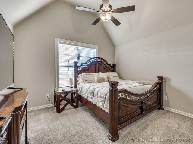 carpeted bedroom featuring ceiling fan and lofted ceiling