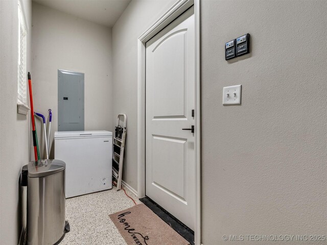 laundry room featuring electric panel