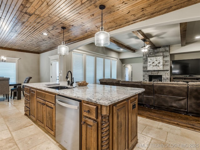 kitchen with an island with sink, a sink, wood ceiling, stone tile floors, and dishwasher