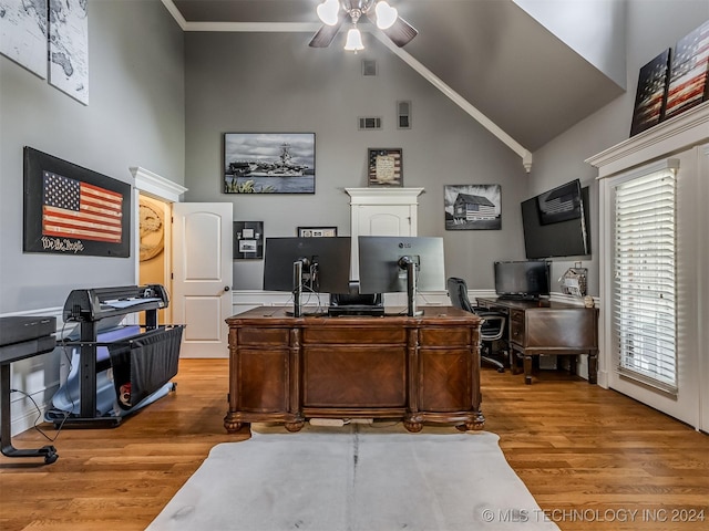 office area with ceiling fan, light hardwood / wood-style flooring, and high vaulted ceiling