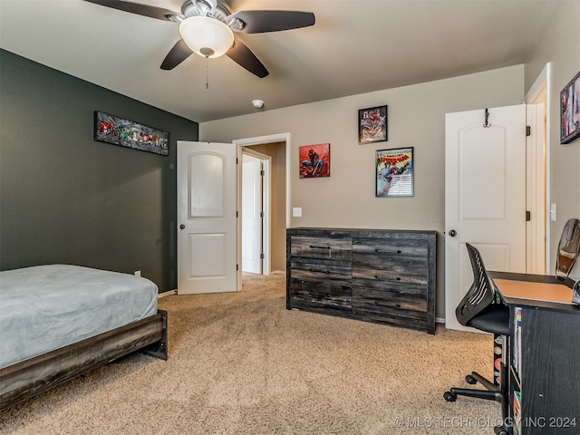 carpeted bedroom with ceiling fan