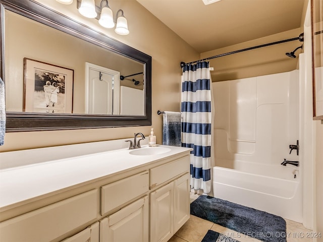 bathroom featuring shower / tub combo, tile patterned floors, and vanity