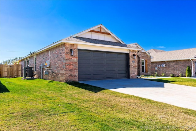 ranch-style house with central AC, a front lawn, and a garage