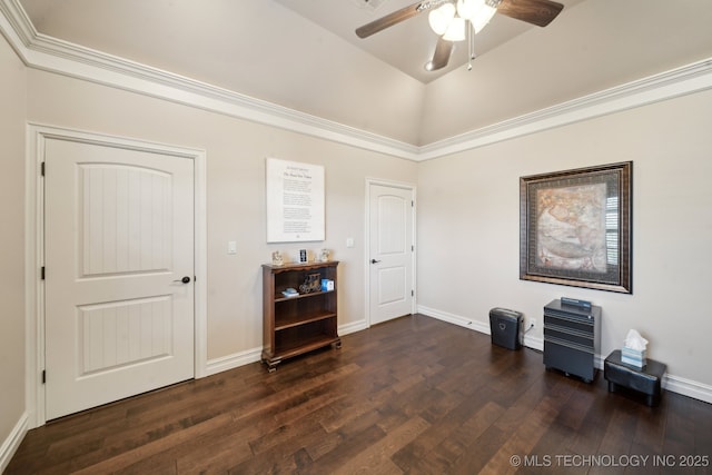 interior space featuring dark wood-style flooring, ceiling fan, and baseboards