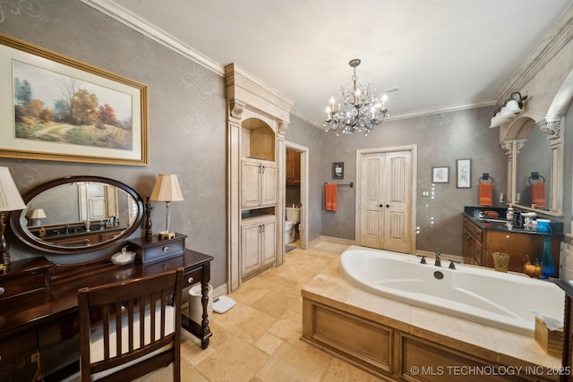 bathroom featuring an inviting chandelier, vanity, stone tile floors, a garden tub, and crown molding