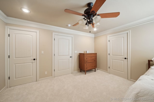 bedroom featuring baseboards, a ceiling fan, light colored carpet, crown molding, and recessed lighting