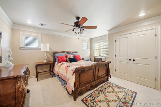 carpeted bedroom with crown molding, recessed lighting, a ceiling fan, and visible vents