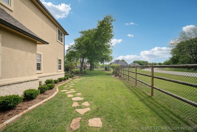 view of yard featuring fence